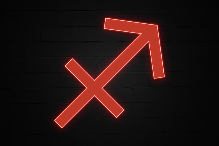 Foto el signo del zodiaco sagitario a la luz del neón