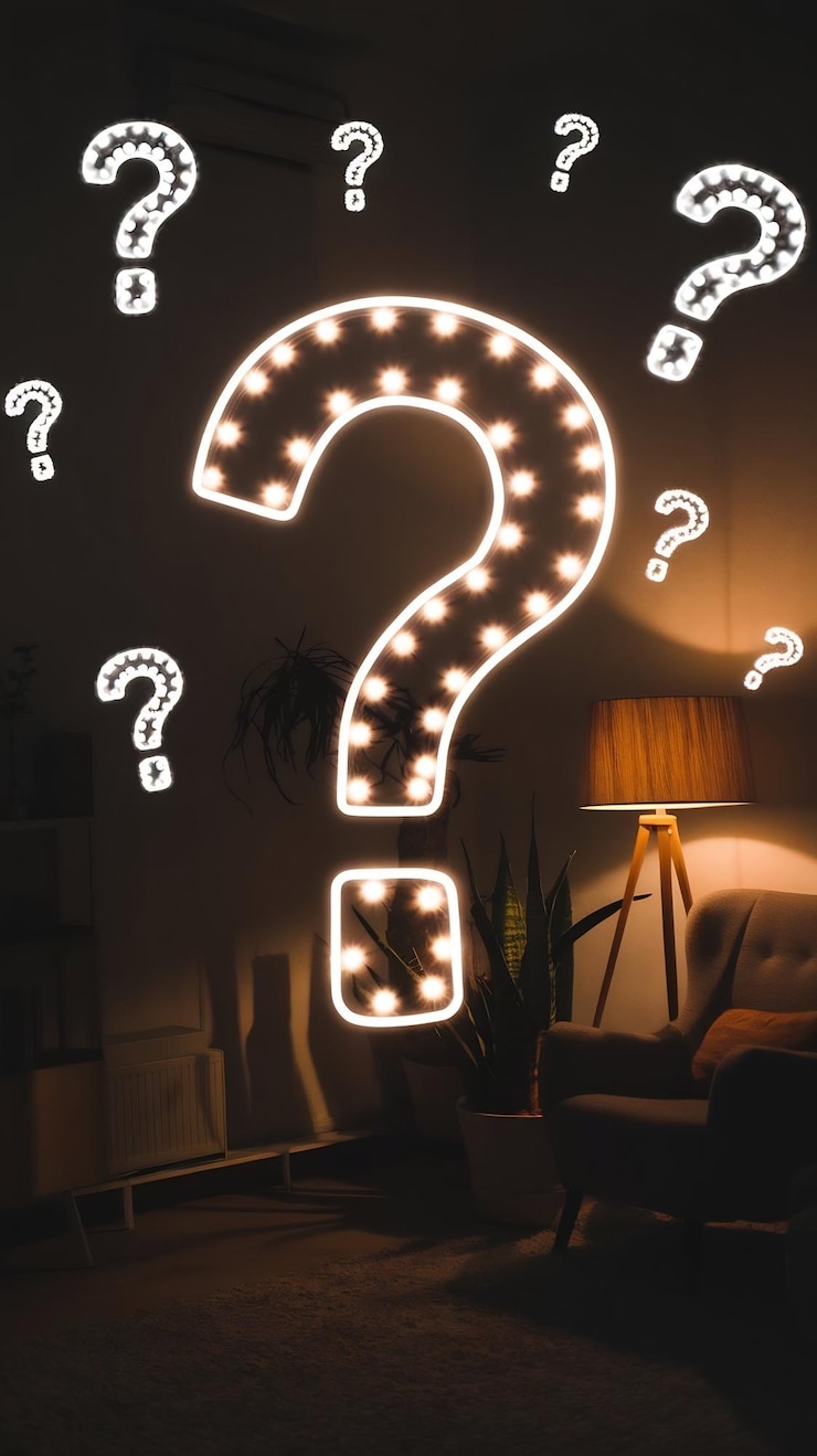 Foto signos de interrogación que brillan intensamente