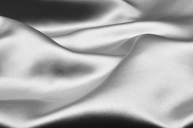 Silberne gewellte silk Hintergrundbeschaffenheit