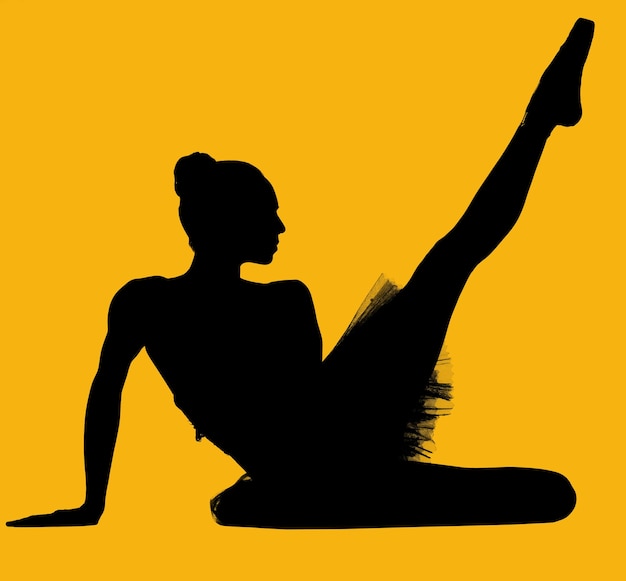 Foto silhouette-ballet-tänzerin tanzt vor gelbem hintergrund