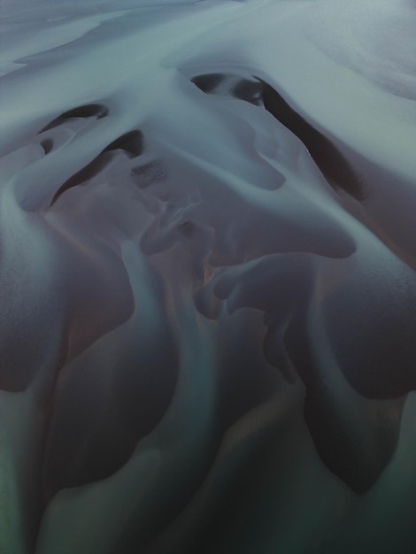 Foto silhouette von gletscherflüssen in island, die wie aquarelle aussehen