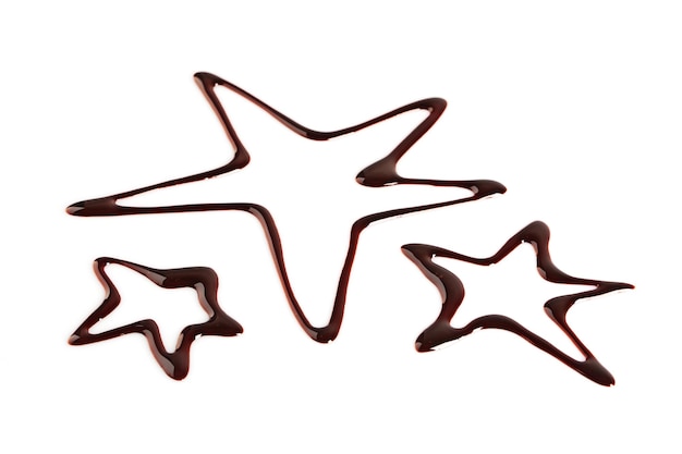 Silhueta de estrelas de chocolate desenhadas isoladas em branco