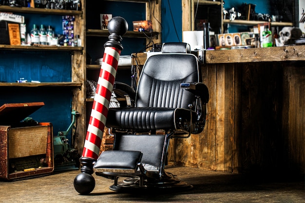 Sillón de barbería. Salón para hombres.