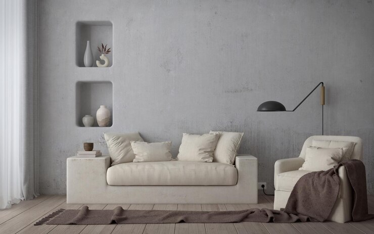 Sillón de sofá interior de salón de estilo mediterráneo sobre suelo de madera y fondo de hormigón blanco
