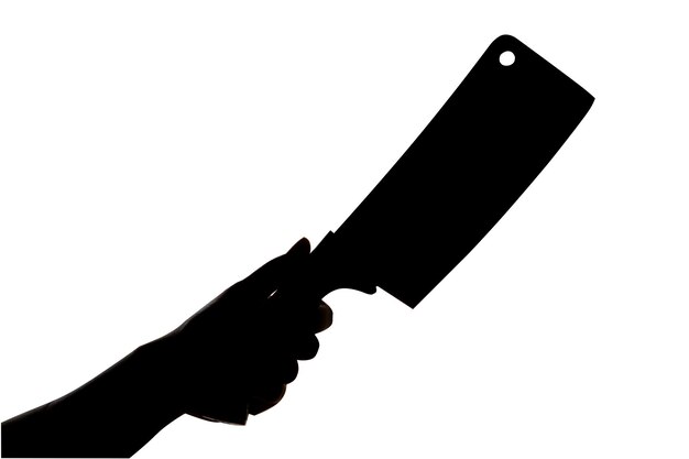 Silueta con un cuchillo en la mano
