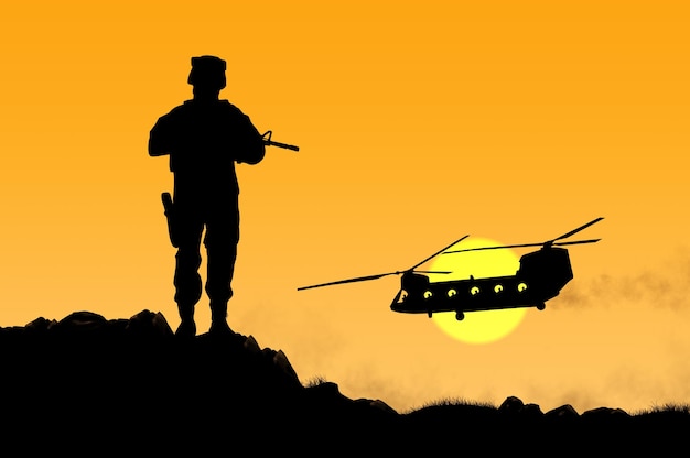 Silueta de un soldado y un helicóptero al atardecer