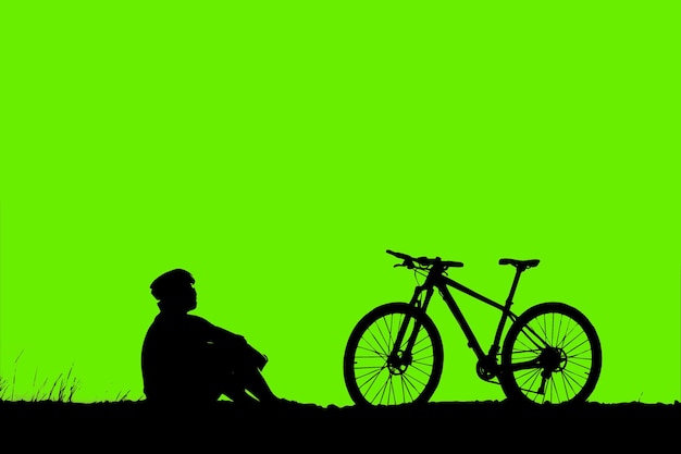Siluetas de bicicletas de montaña y ciclistas por la noche felices Concepto de viaje y fitness