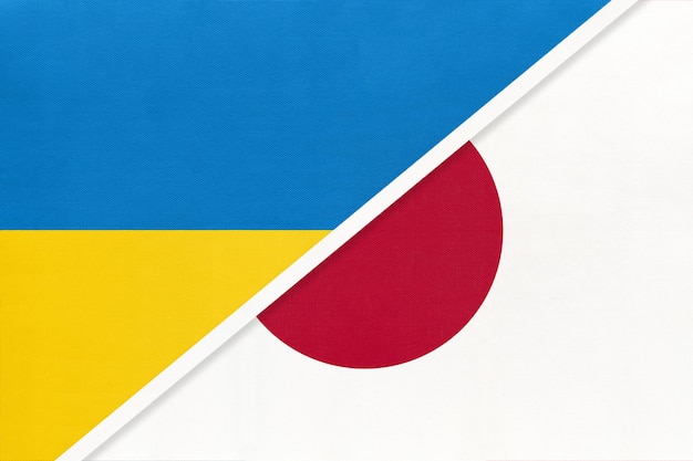Símbolo da Ucrânia e do Japão das bandeiras nacionais ucranianas vs japonesas do país