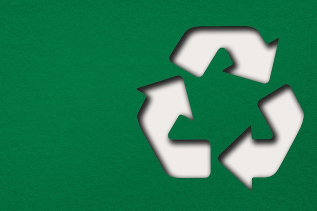 Símbolo de reciclagem Png em fundo texturizado verde