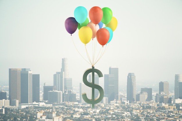 Símbolo de dólar volador en globos de colores