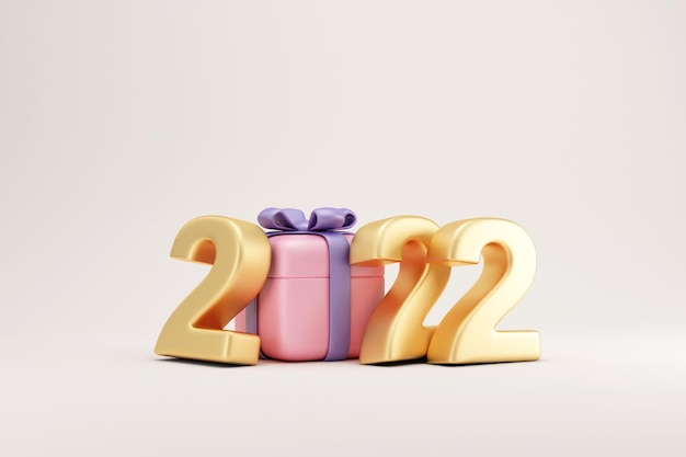 Símbolo dourado de ano novo de 2022 com caixa de presente em fundo claro de estúdio