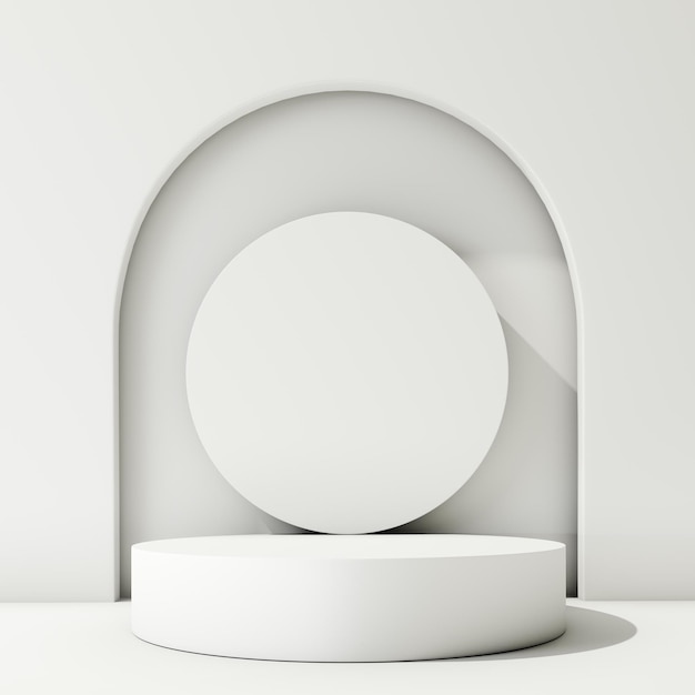 Un simple podio circular blanco se encuentra frente a un telón de fondo arqueado bañado en luz suave.