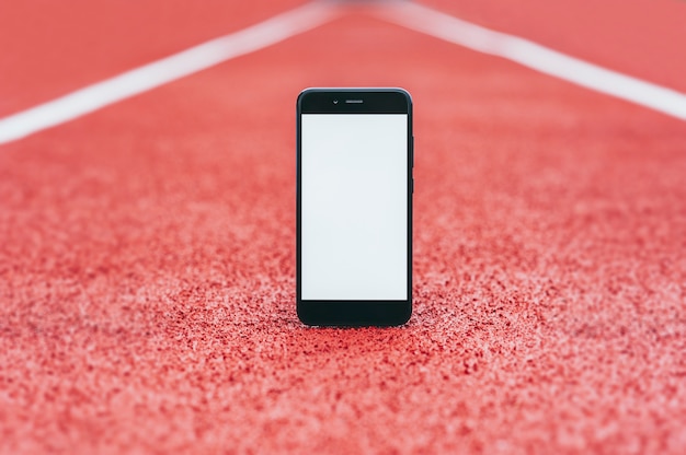 Simulacro de smartphone en el estadio para correr.