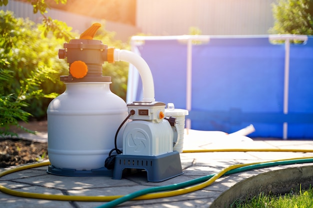 Foto sistema de filtración de agua de la piscina bomba de arena para exteriores que mantiene la pureza del agua limpiando el polvo y la suciedad servicio de la piscina del marco