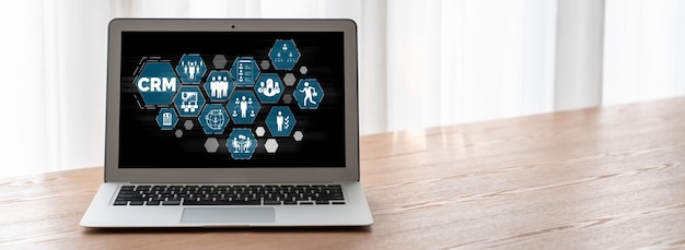 Sistema de gestión de relaciones con el cliente en una computadora de moda para negocios CRM