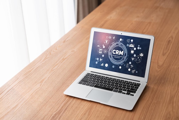 Sistema de gestión de relaciones con el cliente en una computadora de moda para negocios CRM