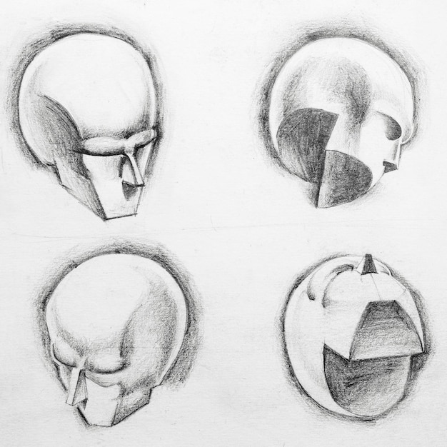 Skizze verschiedener geometrischer Figuren in Form eines menschlichen Kopfes, die von Hand mit schwarzem Bleistift auf weißem Papier gezeichnet wurde.