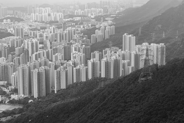Skyline de Hong Kong Kowloon do pôr do sol do Monte Fei Ngo Shan