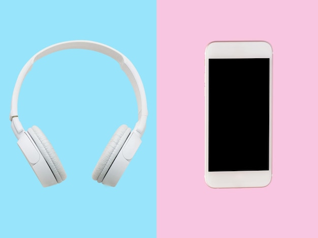 Foto smartphone de fone de ouvido branco sobre fundo azul e rosa