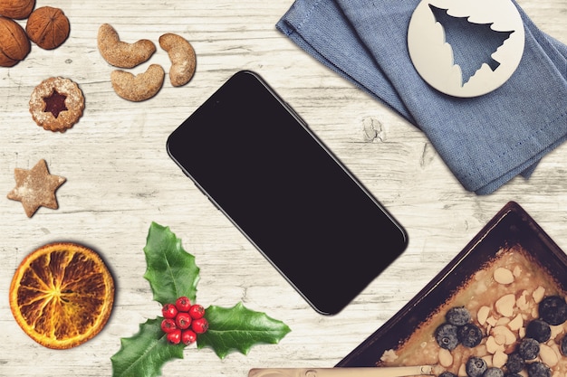 Smartphone em uma cena de natal