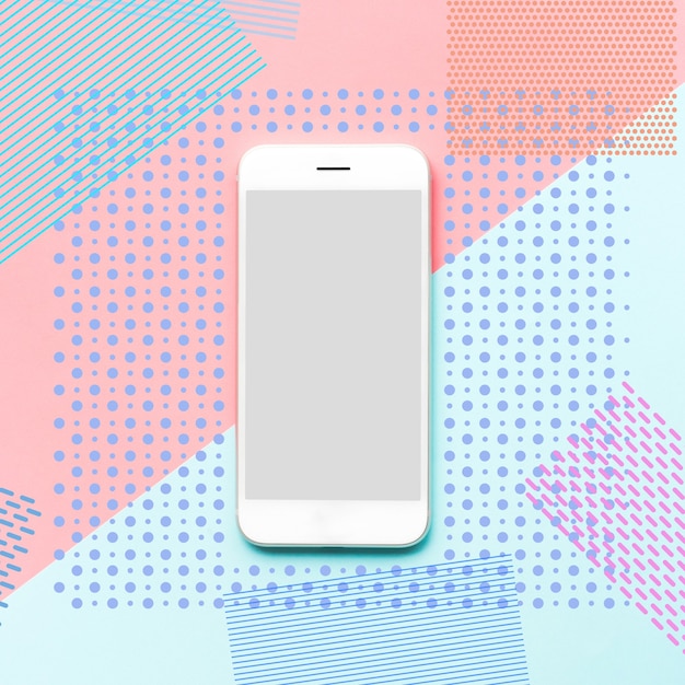 Smartphone con fondo de arte de color de memphis.