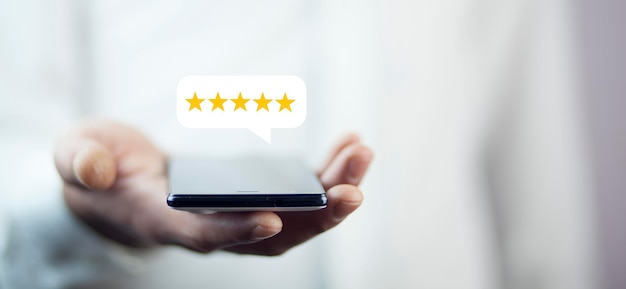 Smartphone zum Erfolgstest Feedback fünf Sterne