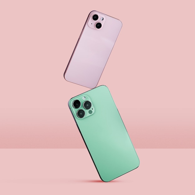 Foto smartphones equilibrando com fundo rosa