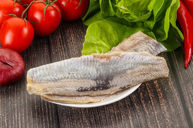 Foto snack de filete de arenque no óleo
