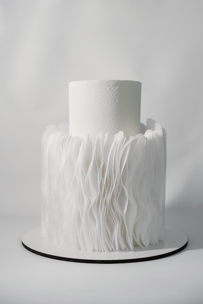 Foto sobremesa de creme de bolo de casamento branco