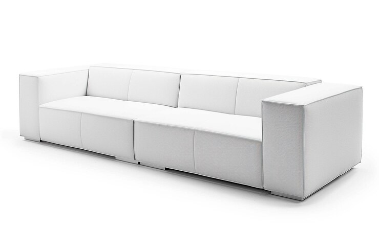 Foto un sofá blanco con un asiento de cuero blanco y un asiento del cuero blanco
