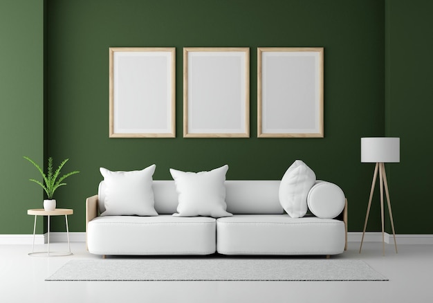 Sofá gris en salón verde con maqueta de tres marcos