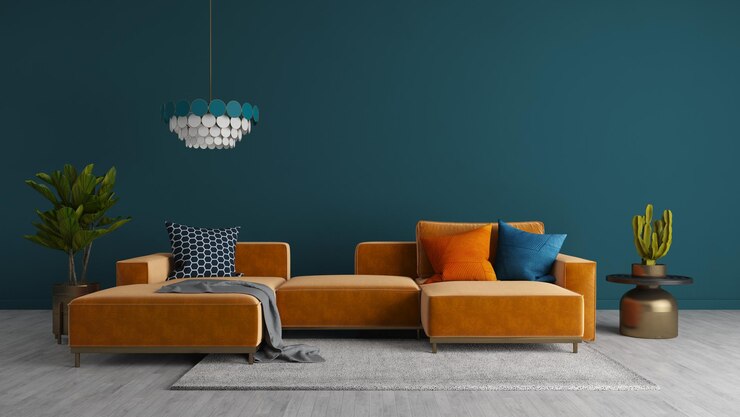 Sofá naranja y pared azul en la sala de estar moderna