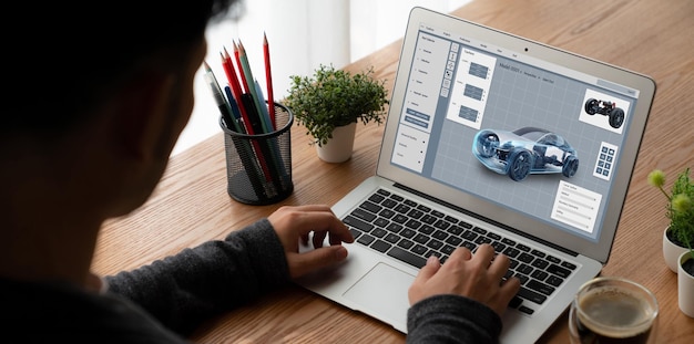El software de diseño de automóviles eléctricos en la pantalla de la computadora muestra el plan de simulación cómodamente