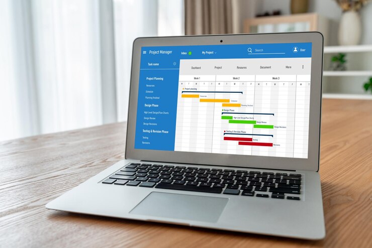 Foto software de planificación de proyectos para la gestión de proyectos empresariales modish en la pantalla de la computadora que muestra el gráfico de línea de tiempo del proyecto del equipo