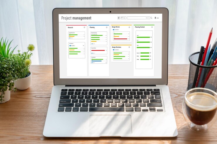 Foto software de planificación de proyectos para la gestión de proyectos empresariales modish en la pantalla de la computadora que muestra el gráfico de línea de tiempo del proyecto del equipo