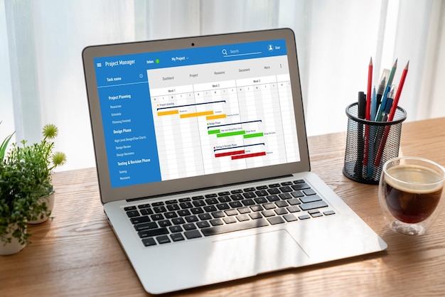 Software de planificación de proyectos para la gestión de proyectos empresariales modish en la pantalla de la computadora que muestra el gráfico de línea de tiempo del proyecto del equipo