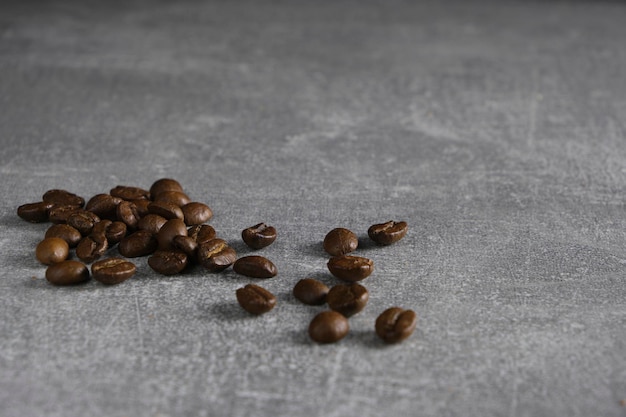 Solos de cimento de grãos de café espalhados