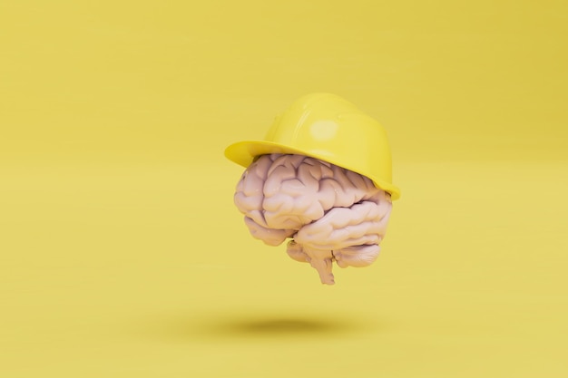 Solución de problemas de ingeniería cerebral en un casco de construcción sobre un fondo amarillo copiar pegar