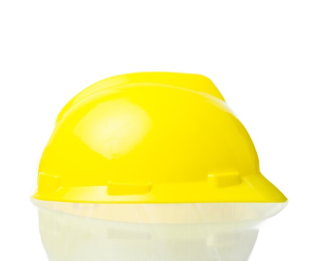 Sombrero amarillo duro para arquitecto de ingenieros de trabajo industrial aislar