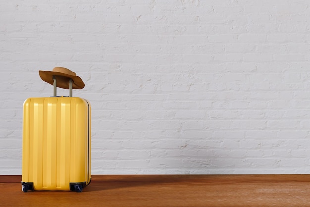 Foto sombrero de equipaje amarillo en la parte superior diseño de fondo de banner de turismo de viajes de verano en diseño de maqueta de pared blanca