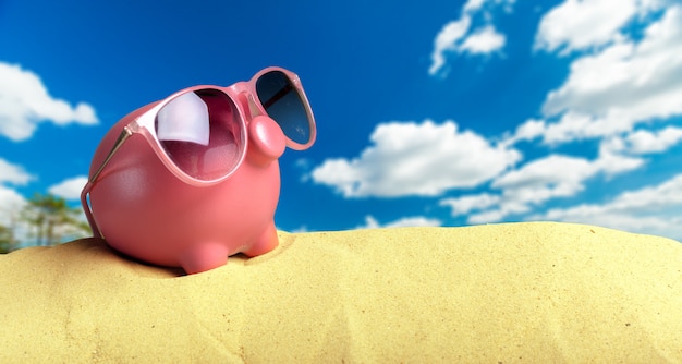 Sommer Sparschwein mit Sonnenbrille am Strand