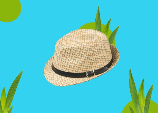 Sommerhut der Männer auf einem abstrakten Hintergrund mit grünem Gras