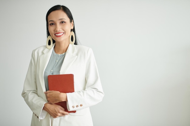 sonriente, elegante, mujer de negocios