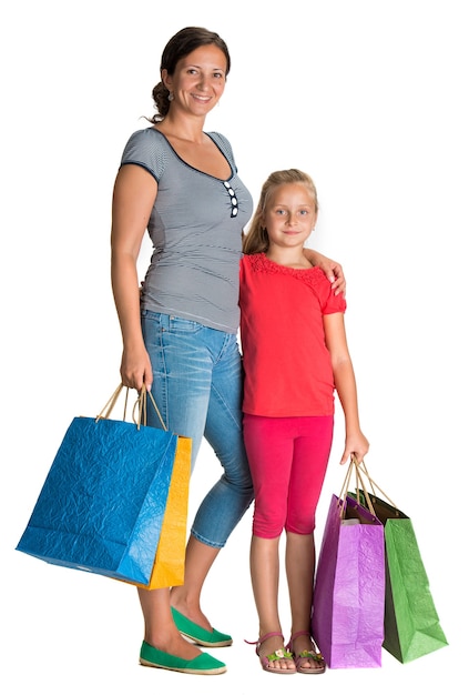 Sonriente, madre e hija, con, bolsas de compras