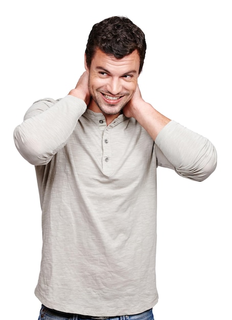 Sonrisa facial y hombre tímido en el estudio aislado en un fondo blanco que se ve feliz y tímido Pensando en un modelo masculino fresco y moderno posando con ropa informal para un estilo moderno y una mentalidad o idea positiva