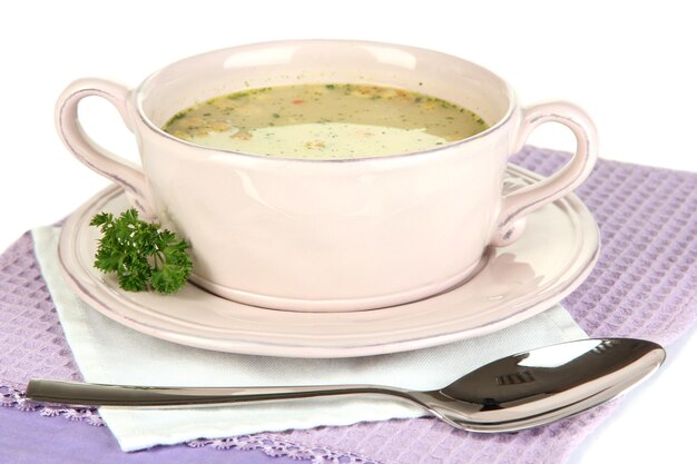 Sopa nutritiva con verduras en pan aislado en blanco