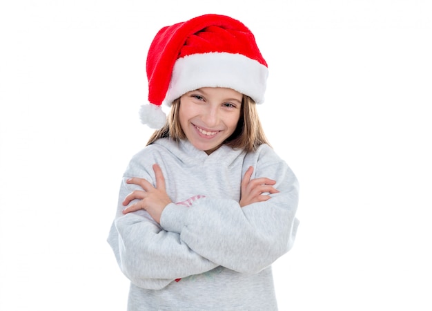 Foto sorridente adolescente no chapéu de papai noel