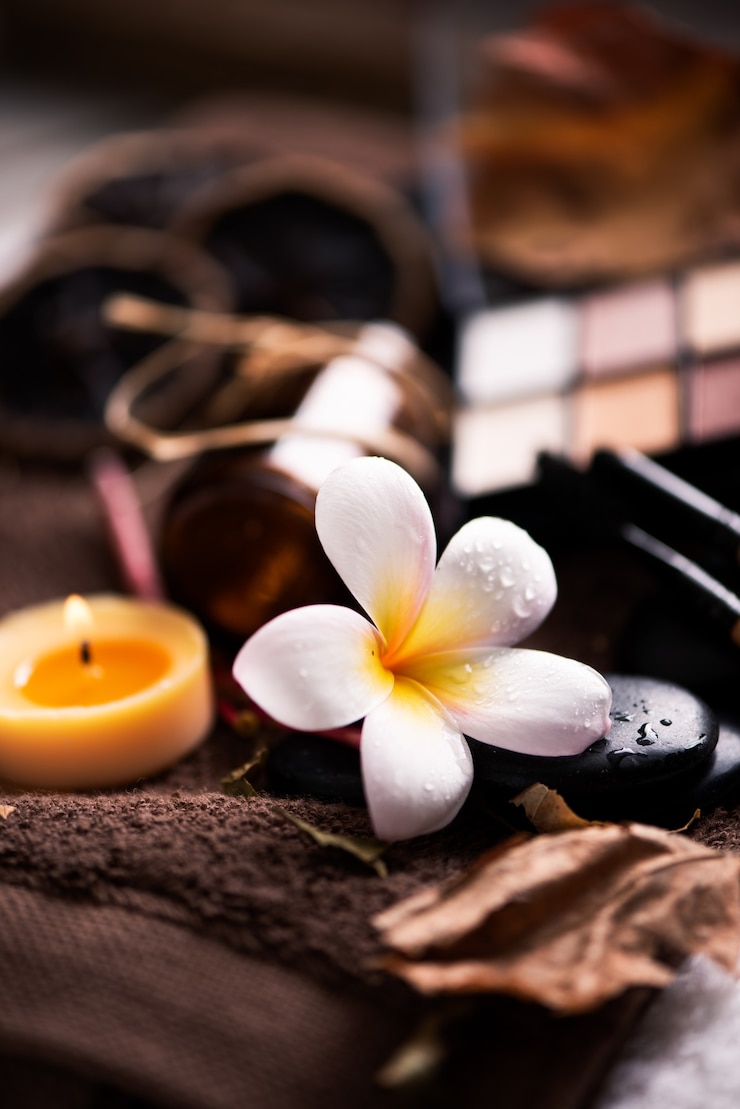 Foto spa-einstellung mit make-up auf handtuch