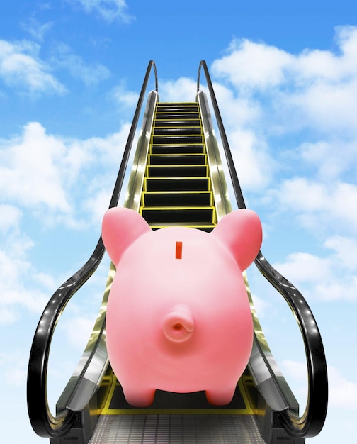 Sparschwein auf Rolltreppe