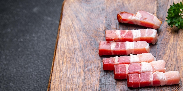 Speckstreifen Schweinefleisch Scheibe Schmalz Fleisch Mahlzeit Snack auf dem Tisch Kopie Raum Essen Hintergrund oben